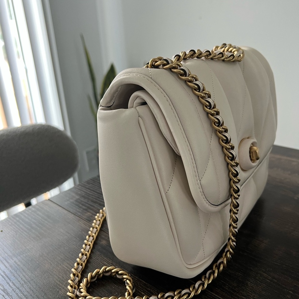 NWT Coach Madison Quilted Bag

Length: 9.25"
Height: 6.75"
Width: 3.25" - Picture 3 of 9